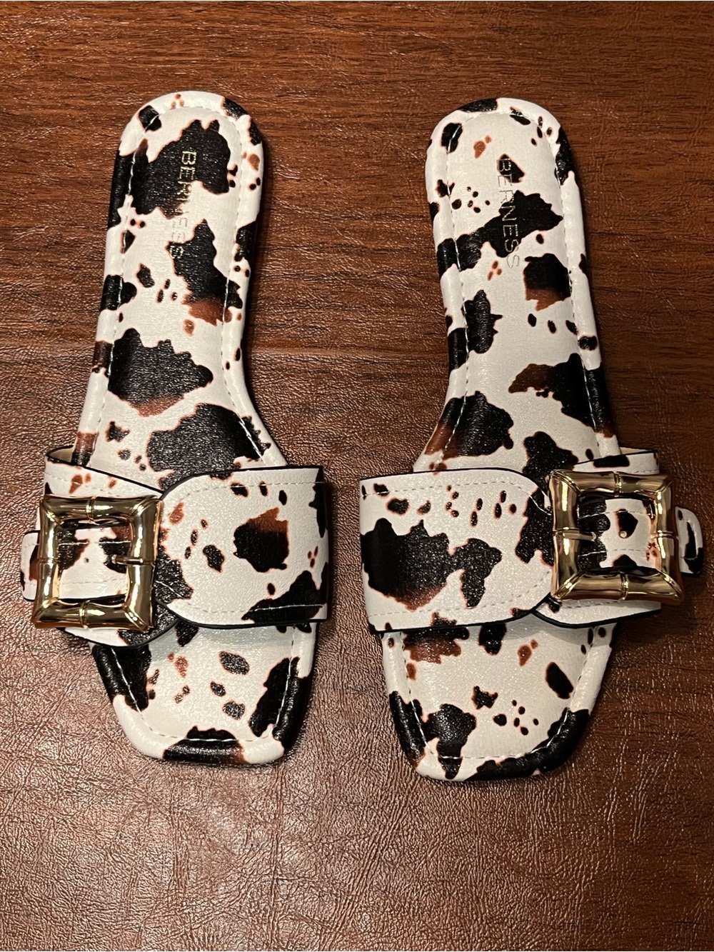 Women's Cow-Print Slide Sandals with Gold Buckle